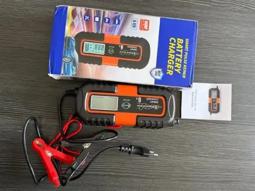 [87] CARGADOR DE BATERÍA